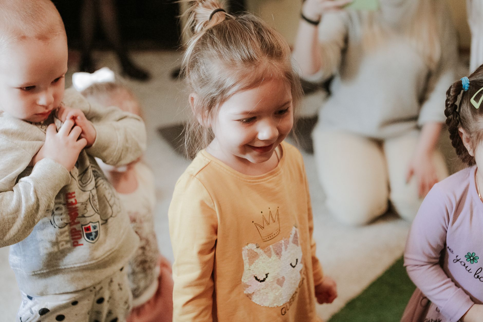 Children learning together in a bright daycare room